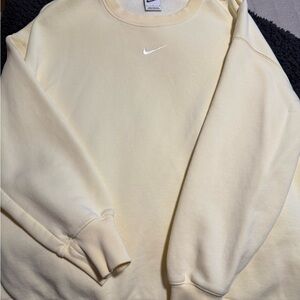 Nike Phoenix; pullover sweater. Butter yellow. Size large. 
Sweatshirt